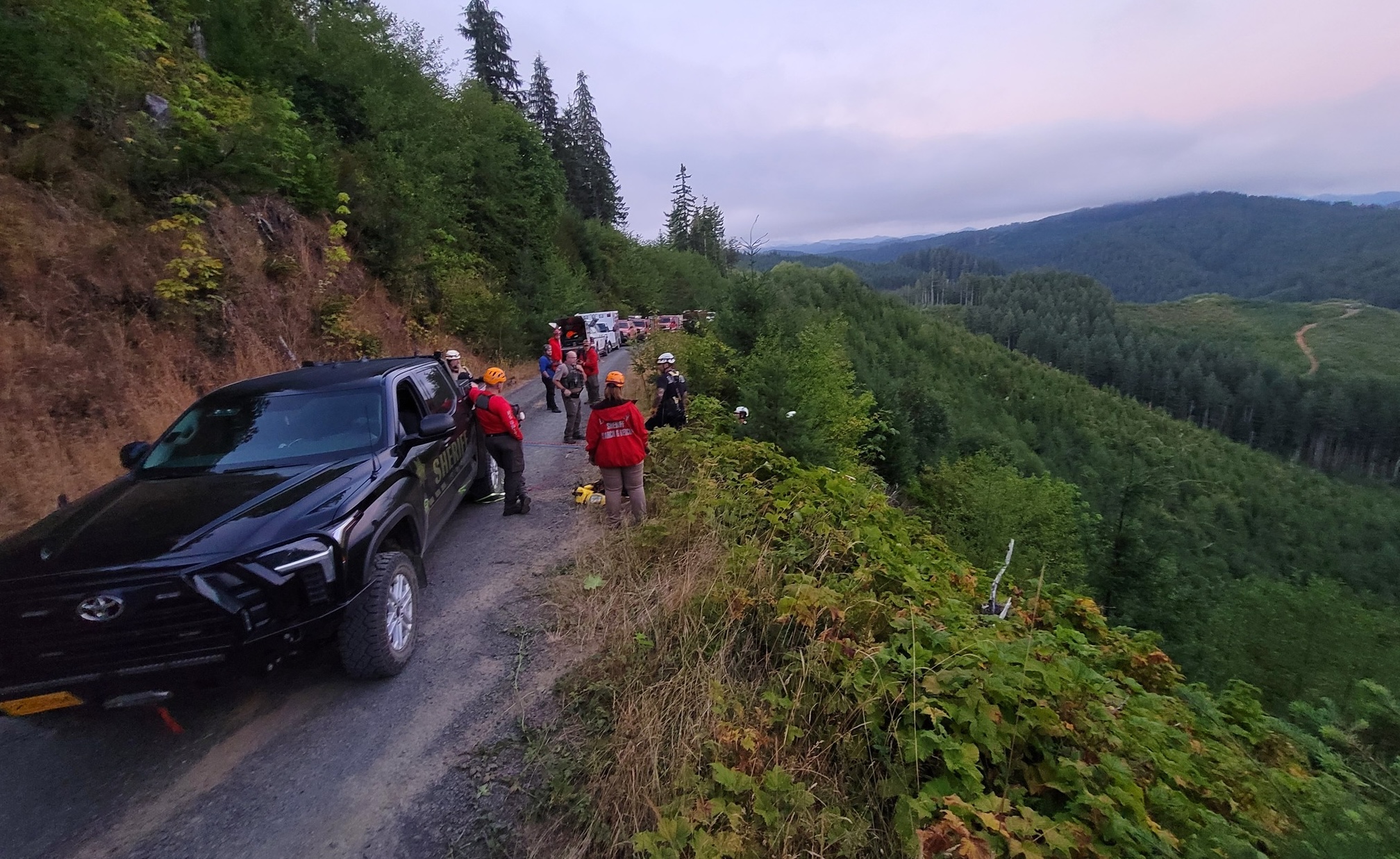 Rescue workers rescue a 63-year-old ATV rider from a ravine south of Yachats on Saturday • YachatsNews.com